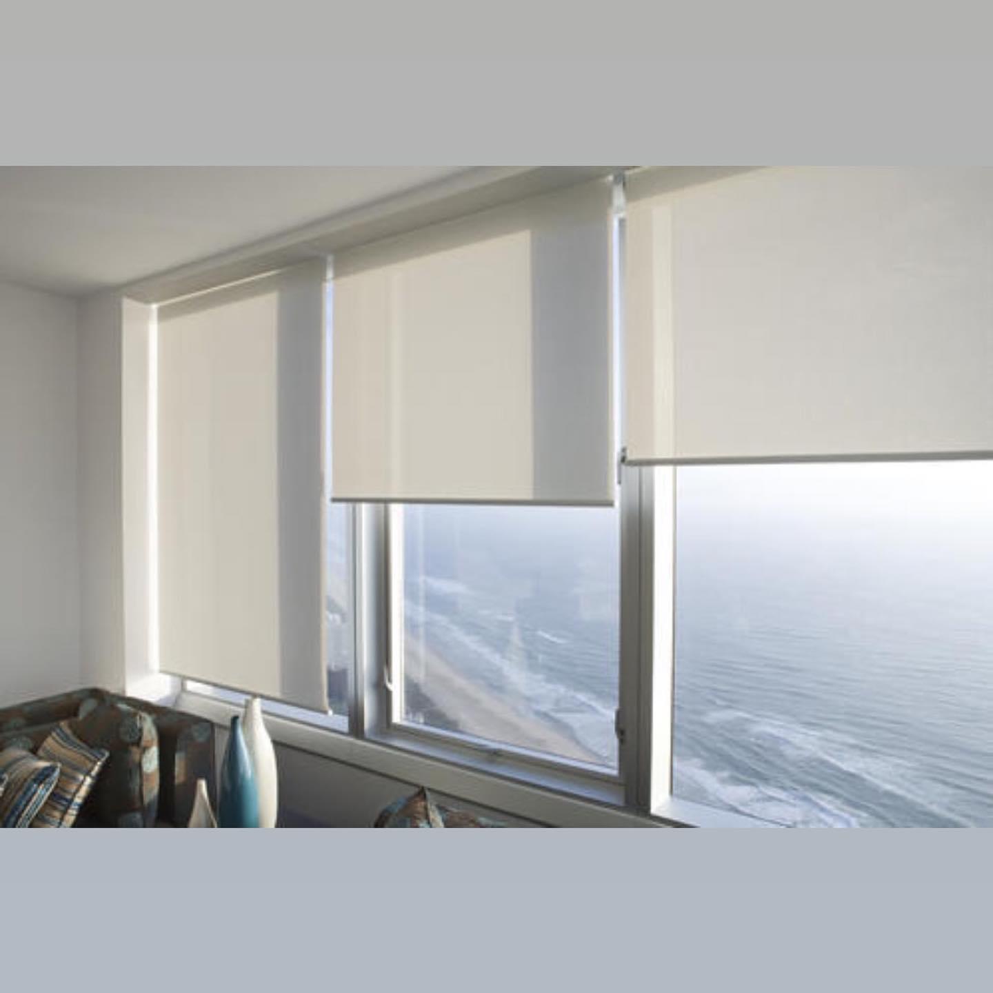 Vertical and roller blinds fitted in a Doha office (view 2)